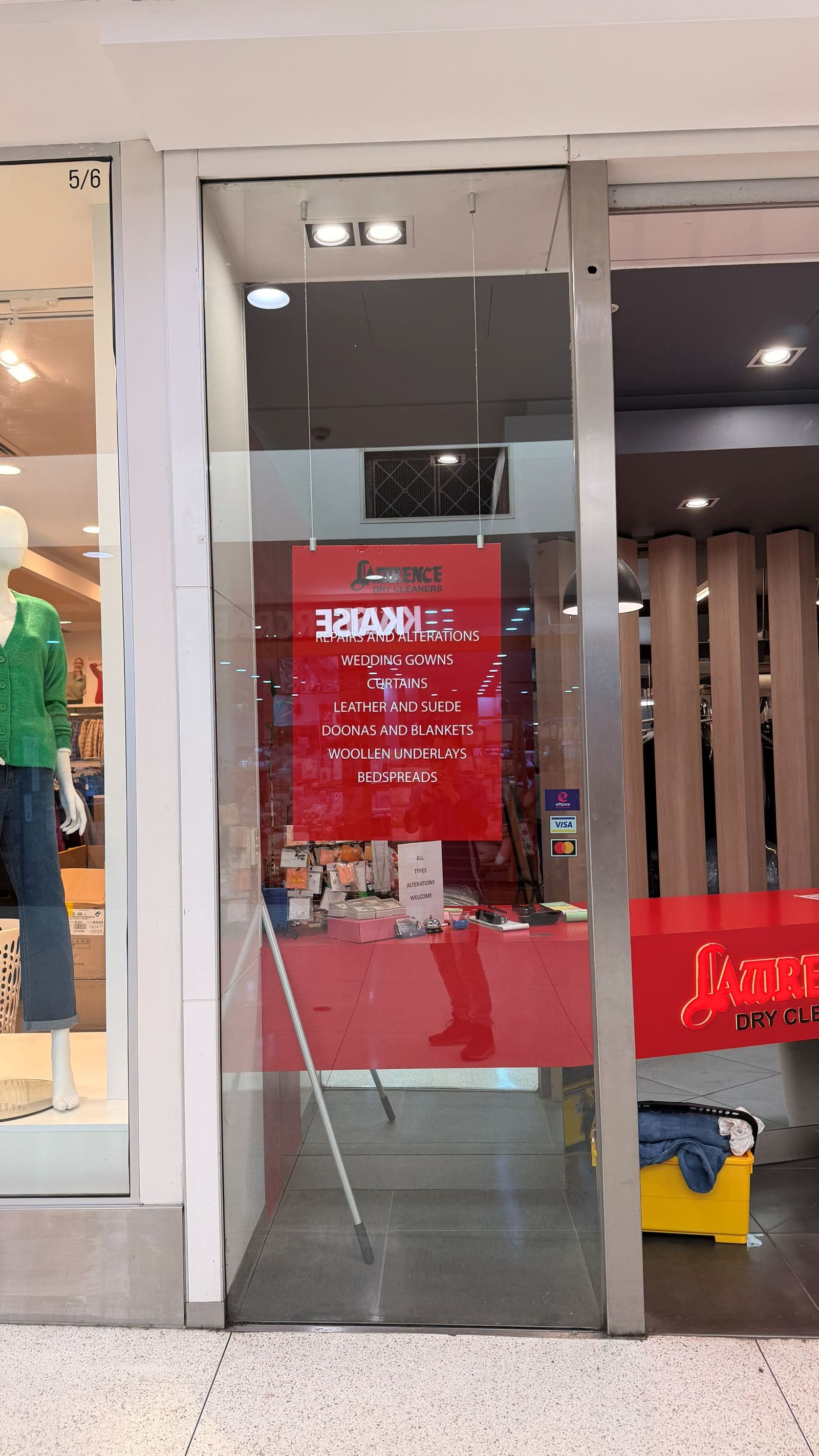Cleaned shopfront glass at a North Rocks drycleaner