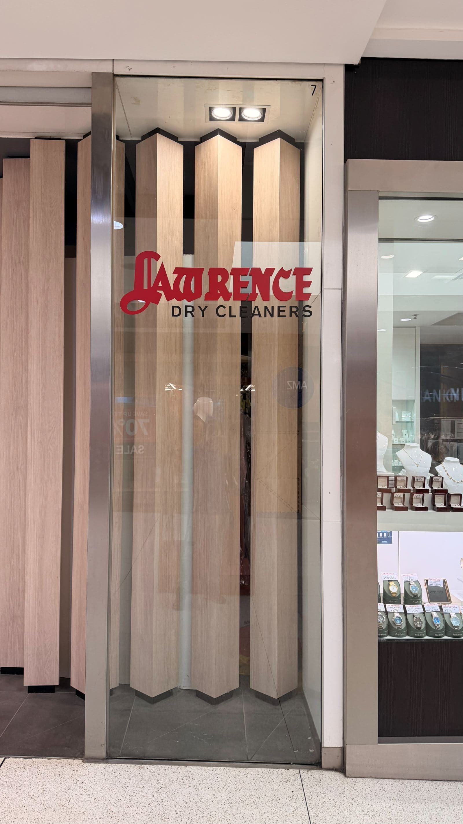 Cleaned shopfront glass at a North Rocks drycleaner